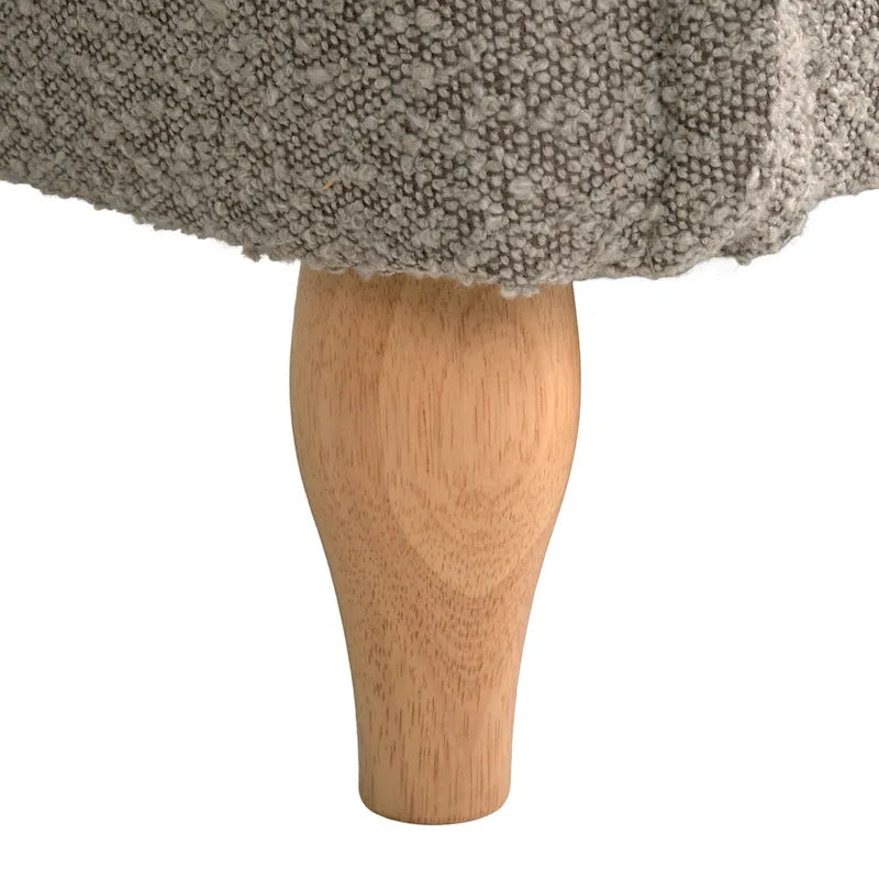 Canapé deux places en bouclé avec pieds en bois