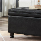 Banc de rangement capitonné noir avec revêtement en similicuir et pieds en bois tournés, Banc Ottoman de rangement