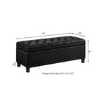 Banc de rangement capitonné noir avec revêtement en similicuir et pieds en bois tournés, Banc Ottoman de rangement